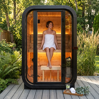 Outdoor Traditional Sauna Built for Relaxation, Natural Spruce Wood, LED Lighting, Panoramic Glass Door — Lifestyle